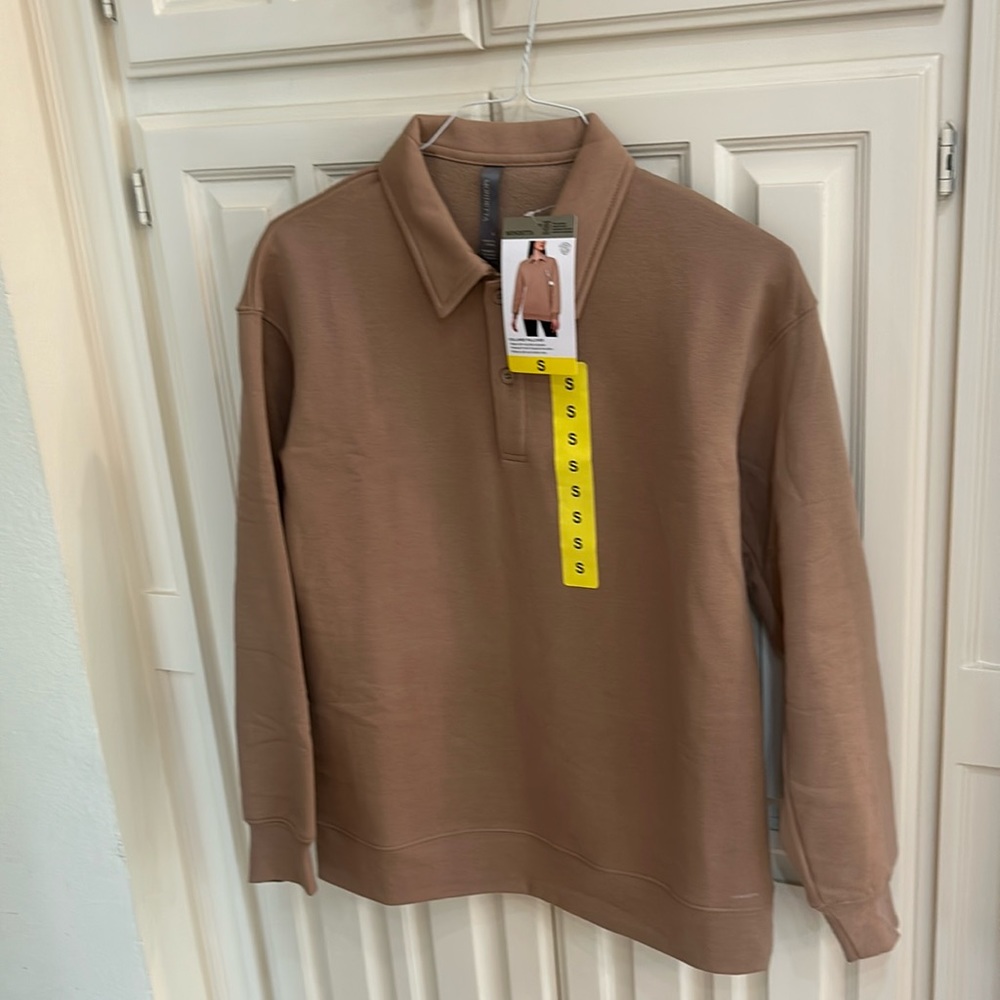 Brand new with tags long sleeve shirt. Size small Mondetta brand. Never worn.